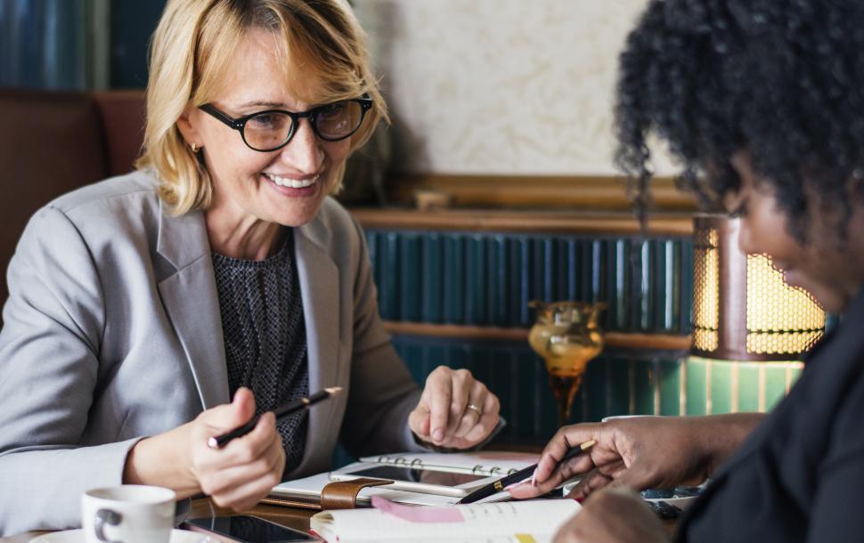 Business owner reviewing Pennsylvania grant applications with an advisor